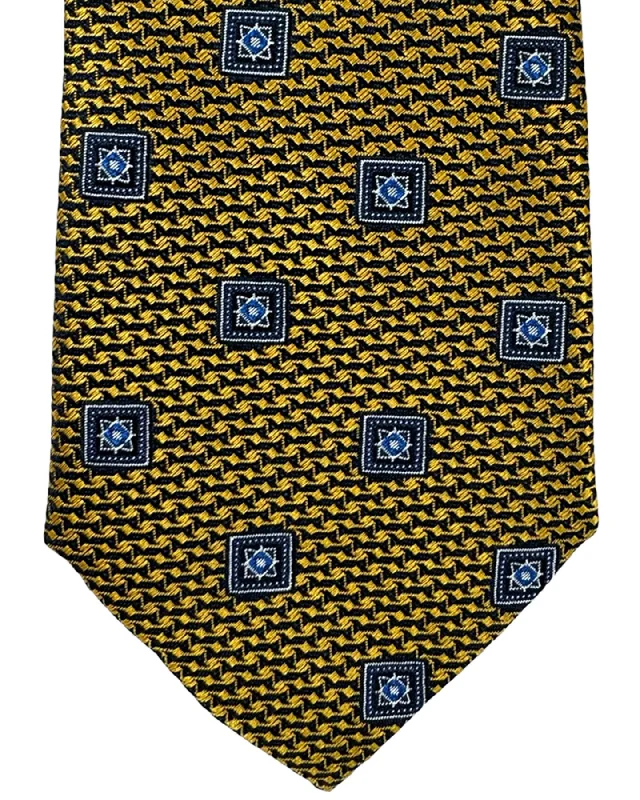 Men's tie with intricate jacquard design-Canali Silk Tie Mustard Navy Medallions Pattern