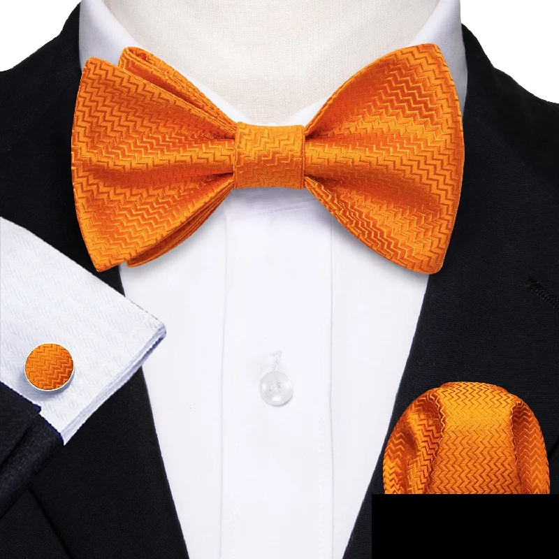 Best men's tie with classic stripes for business attire-Orange Striped Silk Bow Tie Hanky Cufflinks Set