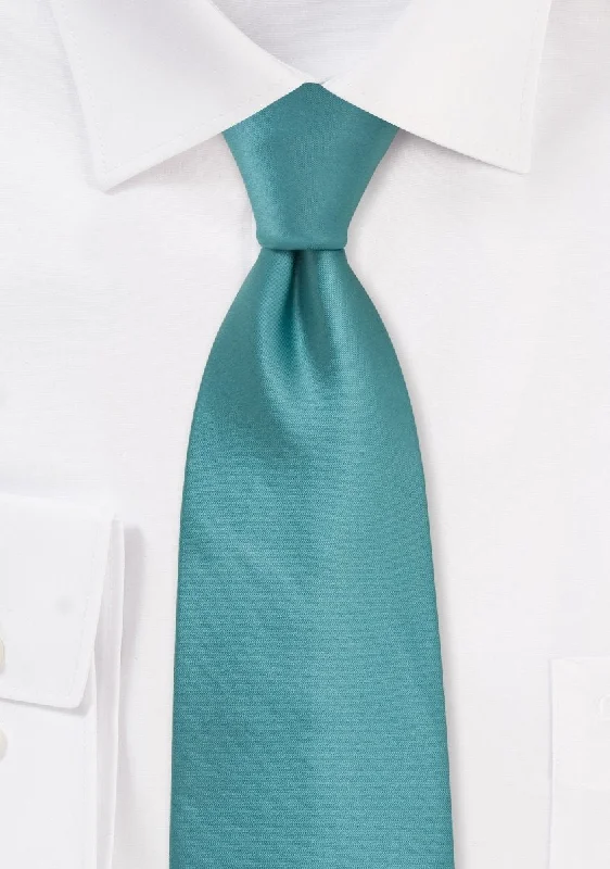 Men's tie with unique patterns for fashion-forward looks-Teal Solid Necktie